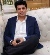 DR. RAVINDER